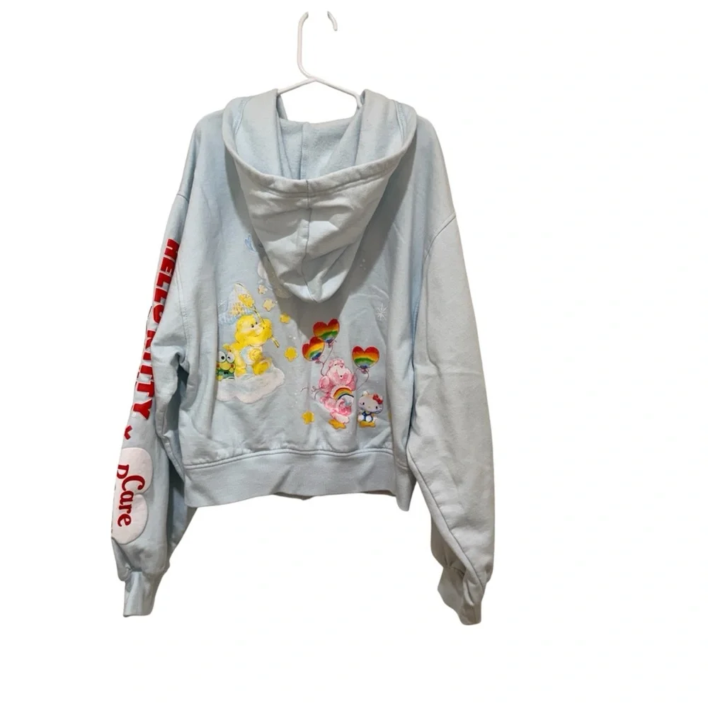 Hello Kitty x Care‎ Bear Collab Hoodie in Light Blue Pride. Junior XS